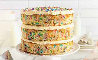 Colourful sprinkles on cake